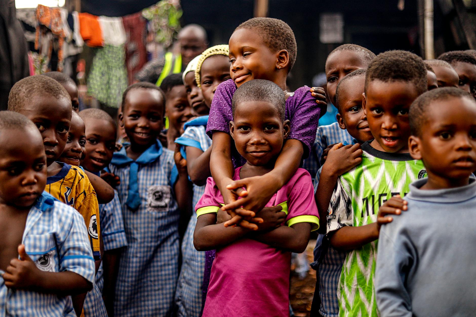 a group of african boys posing for a photo